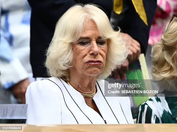 Britain's Queen Camilla is pictured upon her arrival at the Centre Court's Royal Box on the tenth day of the 2023 Wimbledon Championships at The All...