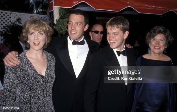 Actor Ben Affleck and mother Chris Boldt and actor Matt Damon and mother Nancy Carlsson-Paige attend the 70th Annual Academy Awards on March 23, 1998...