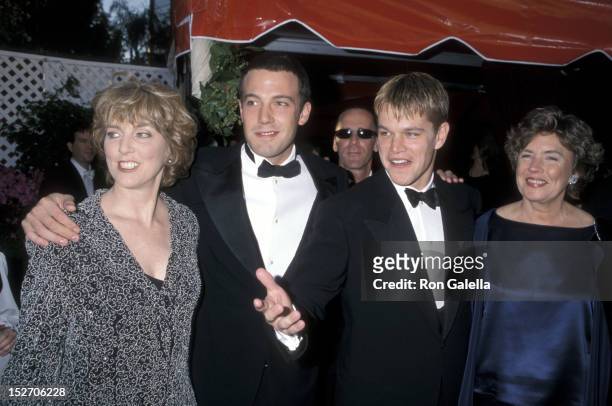 Actor Ben Affleck and mother Chris Boldt and actor Matt Damon and mother Nancy Carlsson-Paige attend the 70th Annual Academy Awards on March 23, 1998...