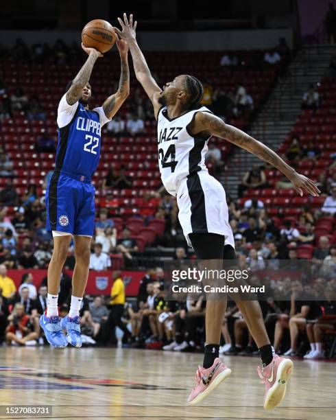 Xavier Moon of LA Clippers takes a shot against Nick Ongenda of Utah Jazz during the fourth quarter of a 2023 NBA Summer League game at the Thomas &...