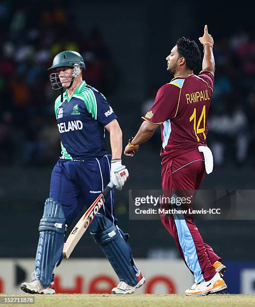 Ravi Rampaul of the West Indies celebrates bowling Kevin O'Brien of Ireland during the ICC World Twenty20 2012 Group B match between West Indies and...