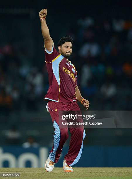 Ravi Rampaul of the West Indies celebrates bowling Kevin O'Brien of Ireland during the ICC World Twenty20 2012 Group B match between the West Indies...