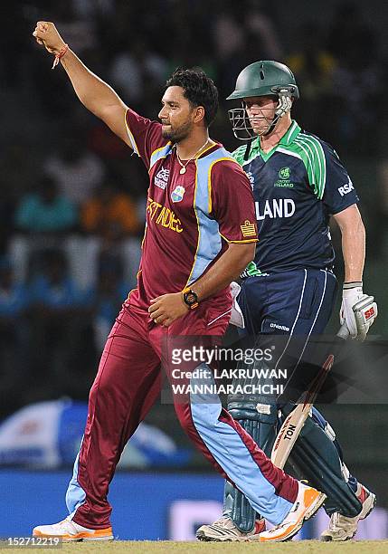 West Indies cricketer Ravi Rampaul celebrates after he dismissed Ireland cricketer Kevin O'Brien during the ICC Twenty20 Cricket World Cup match...