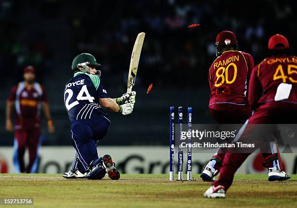 Ireland batsman Ed Joyce being bowled by West Indies bowler Sunil Narine during the ICC T20 World Cup cricket match between West Indies and Ireland...