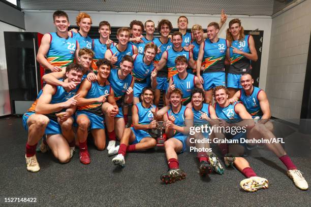 The Allies celebrate with the cup after winning the National Championships following their victory in the 2023 AFL National Championships match...