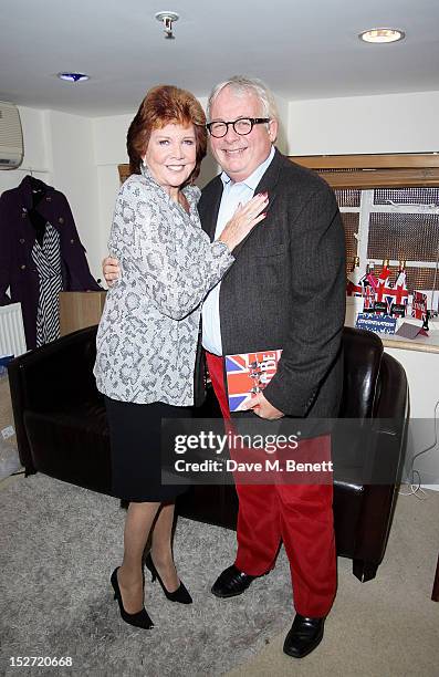 Cilla Black and Christopher Biggins pose backstage during the interval of the press night performance of 'Let It Be' at The Prince Of Wales Theatre...