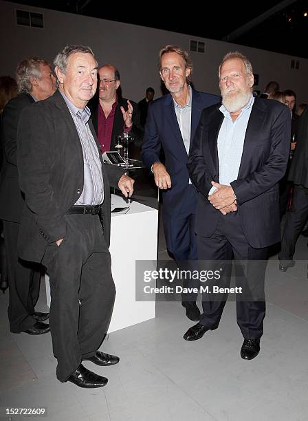 Nick Mason, Mike Rutherford and Tony Smith, manager of Genesis, arrive at the EMI Music Sound Foundation fundraiser at Somerset House on September...