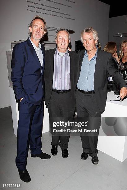 Musicians Mike Rutherford, Nick Mason and Tony Banks arrive at the EMI Music Sound Foundation fundraiser at Somerset House on September 24, 2012 in...