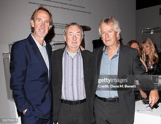 Musicians Mike Rutherford, Nick Mason and Tony Banks arrive at the EMI Music Sound Foundation fundraiser at Somerset House on September 24, 2012 in...