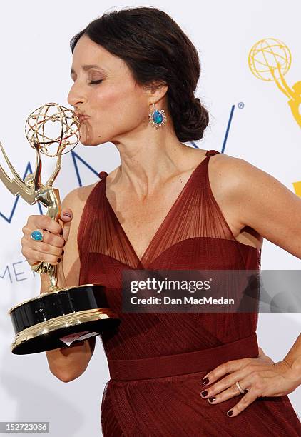 Actress Julia Louis-Dreyfus poses in the press room at the 64th Primetime Emmy Awards held at Nokia Theatre L.A. Live on September 23, 2012 in Los...