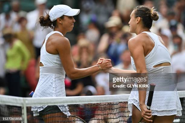 Belarus's Aryna Sabalenka shakes hands after winning against US player Madison Keys during their women's singles quarter-finals tennis match on the...