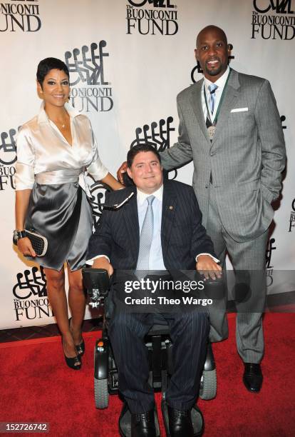 Tracey Mourning , Marc Buoniconti and former NBA basketball player Alonzo Mourning attends the 27th Annual Great Sports Legends Dinner to benefit the...