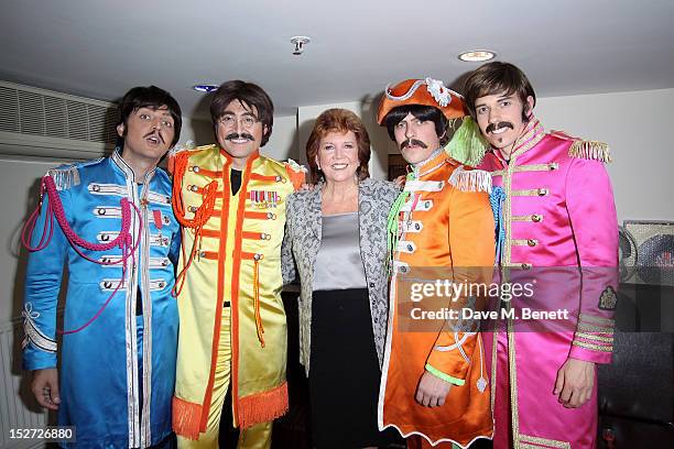 Cilla Black poses with cast members Ian Garcia, Reuven Gershon, Stephen Hill and Phil Martin at the interval during the press night performance of...