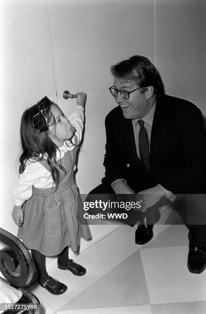 Cecilia Becker and guest attend an event at the Wang residence in New York City on December 8, 1994.