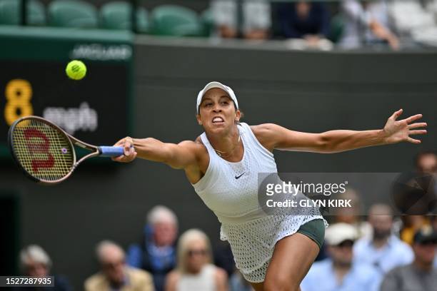 Player Madison Keys returns the ball to Belarus's Aryna Sabalenka during their women's singles quarter-finals tennis match on the tenth day of the...