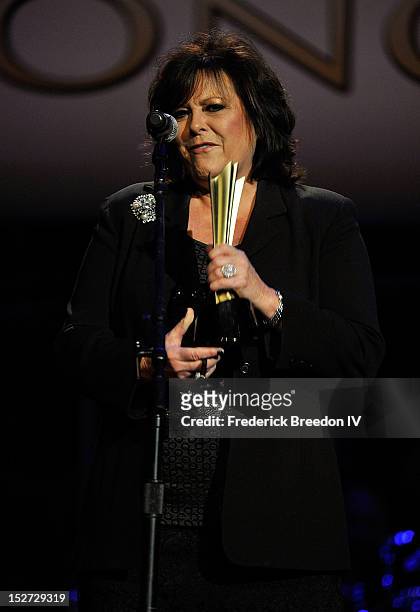 Mary Arnold accepts the Poet's Award on behalf of her late husband Roger Miller at the 6th Annual ACM Honors at Ryman Auditorium on September 24,...