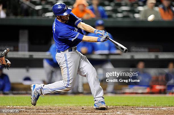 Arencibia of the Toronto Blue Jays hits a grand slam in the seventh inning against the Baltimore Orioles at Oriole Park at Camden Yards on September...