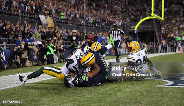 Wide receiver Golden Tate of the Seattle Seahawks makes a catch in the end zone to defeat the Green Bay Packers 14-12 on a controversial call by the...