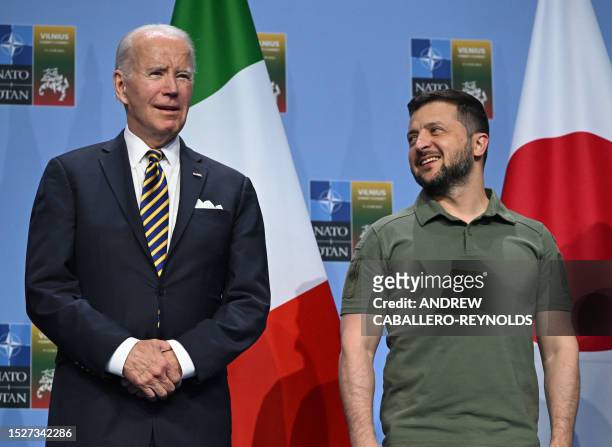 President Joe Biden and Ukrainian President Volodymyr Zelensky pose during an event with G7 leaders to announce a Joint Declaration of Support for...