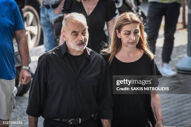 The parents of late football fan Alkis Kampanos, a nineteen-year-old supporter beaten to death by PAOK hooligan in February 2022, arrive at the court...