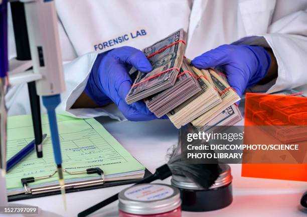 forensic analysis of banknotes - forensic science technician stock pictures, royalty-free photos & images