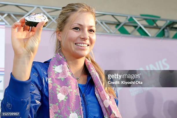 Maria Kirilenko of Russia makes the 'Futomaki' sushi rolls during day three of the Toray Pan Pacific Open at Ariake Colosseum on September 25, 2012...