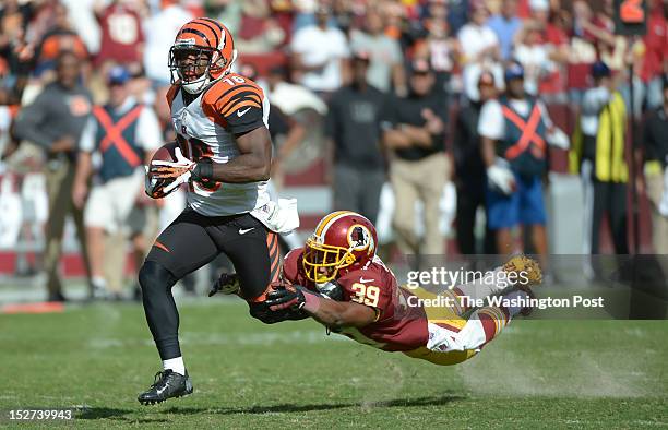 Cincinnati Bengals wide receiver Andrew Hawkins leaves Washington Redskins cornerback Richard Crawford in his wake on his way to a 4th quarter...