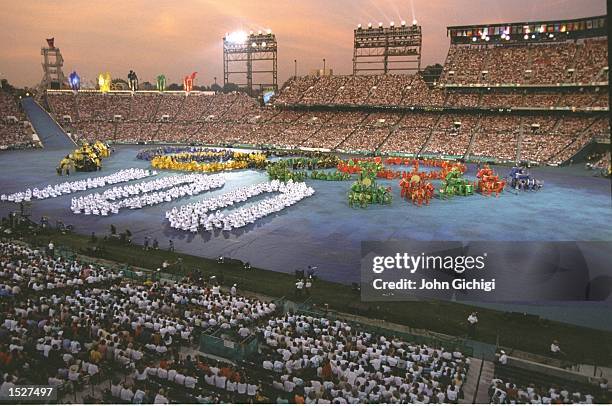 Children form the Olympic Rings and the figure 100 to represent the Centennial Olympic Games during the Opening Ceremony of the 1996 Olympic Games in...