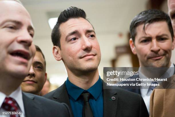 David Daleiden, center, shows up to the Harris County Criminal Court with his legal, Thursday, Feb. 4 in Houston.