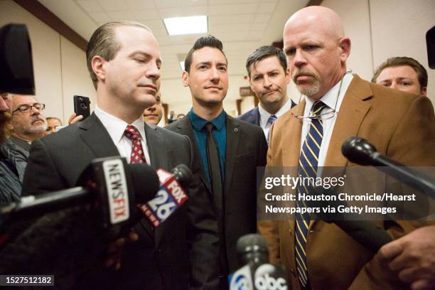 David Daleiden, center, and his attorneys speak to the press at the Harris County Criminal Court, Thursday, Feb. 4 in Houston.