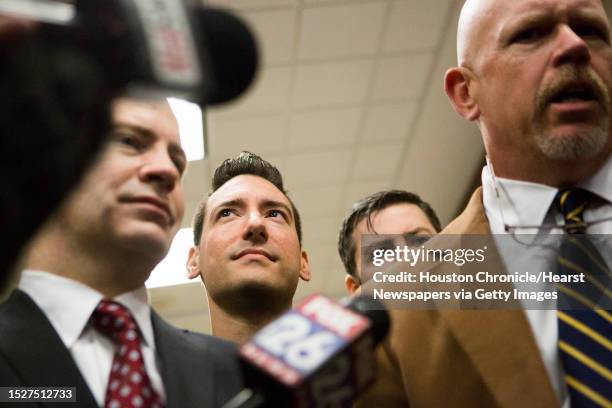 David Daleiden, center, and his attorneys speak to the press at the Harris County Criminal Court, Thursday, Feb. 4 in Houston.