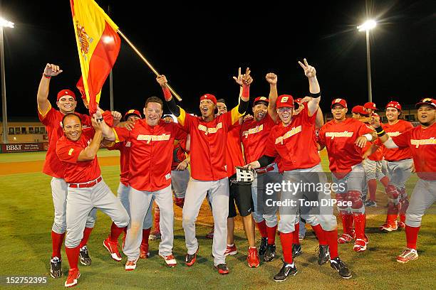 Team Spain celebrates on the field after defeating Team Israel in game 6 of the Qualifying Round of the World Baseball Classic at Roger Dean Stadium...