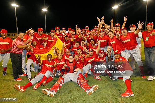 Team Spain celebrates on the field after defeating Team Israel in game 6 of the Qualifying Round of the World Baseball Classic at Roger Dean Stadium...