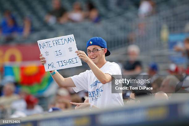 Fan is seen in the stands holding up a sign for Nate Freiman of Team Israel during game 6 of the Qualifying Round of the World Baseball Classic at...