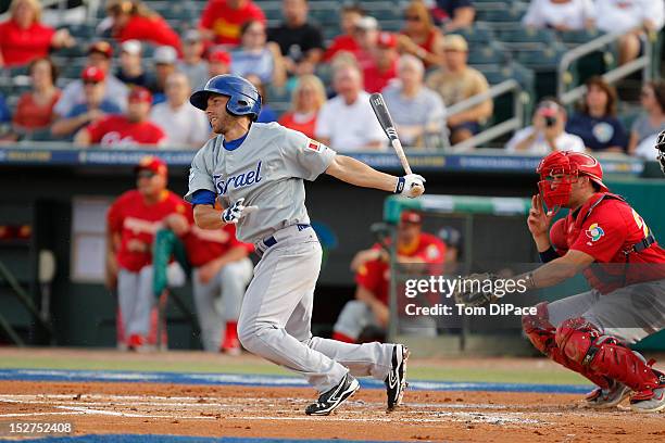 Ben Guez of Team Israel bats against Team Spain during game 6 of the Qualifying Round of the World Baseball Classic at Roger Dean Stadium on...