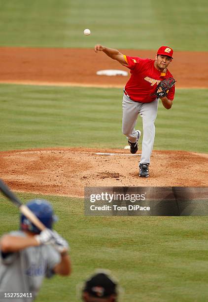 Eric Gonzalez of Team Spain pitches against Team Israel during game 6 of the Qualifying Round of the World Baseball Classic at Roger Dean Stadium on...