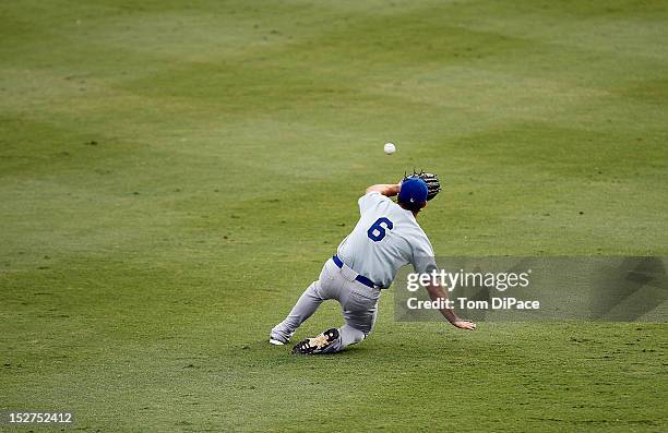 Cody Decker of Team Israel makes a sliding catch against Team Spain during game 6 of the Qualifying Round of the World Baseball Classic at Roger Dean...