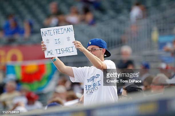 Fan is seen in the stands holding up a sign for Nate Freiman of Team Israel during game 6 of the Qualifying Round of the World Baseball Classic at...