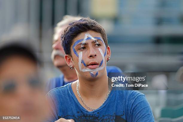 Fan of Team Israel is seen in the stands with the colors of Team Israel painted on his face during game 6 of the Qualifying Round of the World...