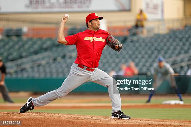 Eric Gonzalez of Team Spain pitches against Team Israel during game 6 of the Qualifying Round of the World Baseball Classic at Roger Dean Stadium on...