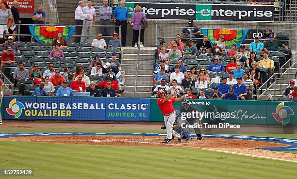 Barbaro Canizares of Team Spain bats against Team Israel during game 6 of the Qualifying Round of the World Baseball Classic at Roger Dean Stadium on...