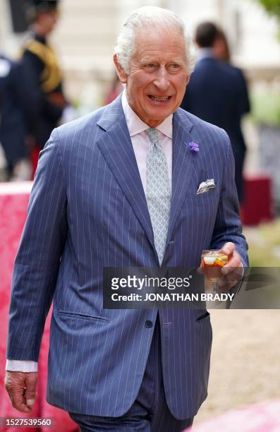 Britain's King Charles III attends a reception for charities and organisations that have been supported by, and partnered with, The Prince of Wales's...