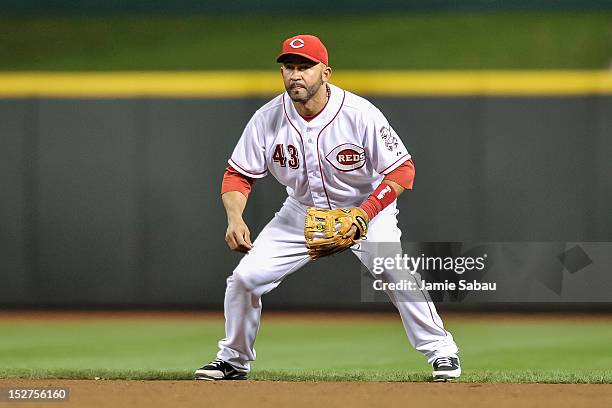 Miguel Cairo of the Cincinnati Reds plays second base against the Los Angeles Dodgers at Great American Ball Park on September 23, 2012 in...