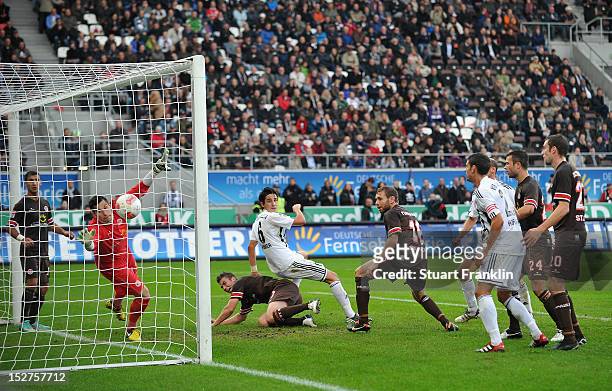 Benjamin Huebner of Aalen scores the winning goal during the Second Bundesliga match between FC. St. Pauli and VfR Aalen at Millerntor Stadium on...