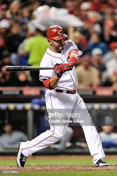 Miguel Cairo of the Cincinnati Reds bats against the Los Angeles Dodgers at Great American Ball Park on September 23, 2012 in Cincinnati, Ohio.