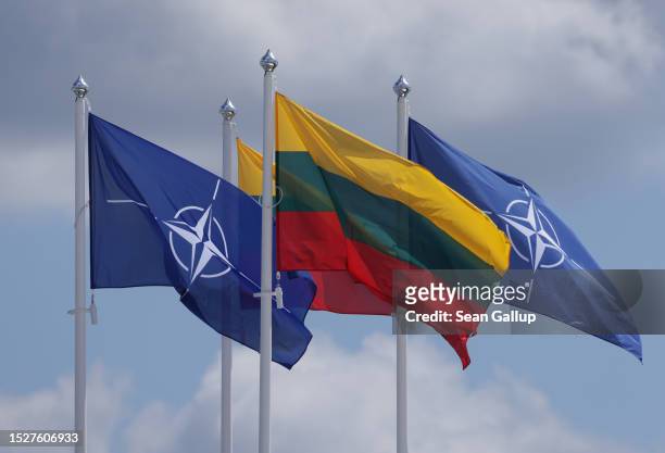 The NATO and Lithuanian flags fly over the summit venue on July 09, 2023 in Vilnius, Lithuania. Vilnius is scheduled to host the July NATO Summit.