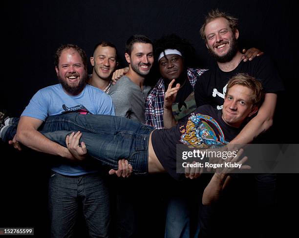 Matt McCaughan, Colin Stetson, Sean Carey, Reggie Pace, Justin Vernon, Mike Noyce of Bon Iver pose for a portrait backstage after their performance...