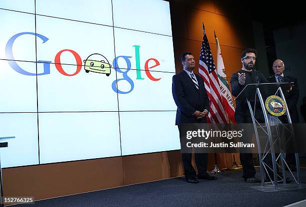 California Gov. Jerry Brown and California State Sen. Alex Padilla look on as Google co-founder Sergey Brin speaks during a news conference at the...