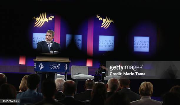 Egyptian President Mohamed Morsi is seen through a camera crane arm while speaking at the Clinton Global Initiative meeting on September 25, 2012 in...