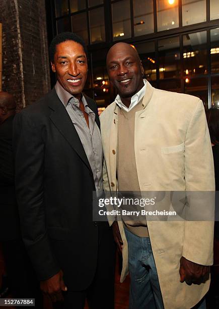 Scottie Pippen and Michael Jordan attend the surprise birthday celebration for Scottie Pippen at Sunda on September 24, 2012 in Chicago, Illinois.